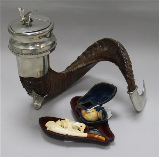 An Edwin Blyde pewter-mounted rams horn snuff mull and two cased Meerschaum cheroot holders width 26cm height 23cm